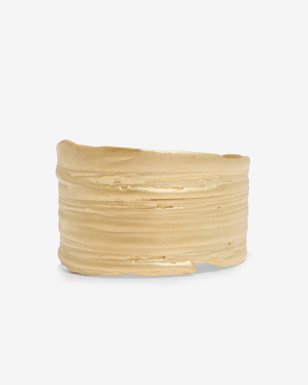 Handcrafted gold bracelet on a white background