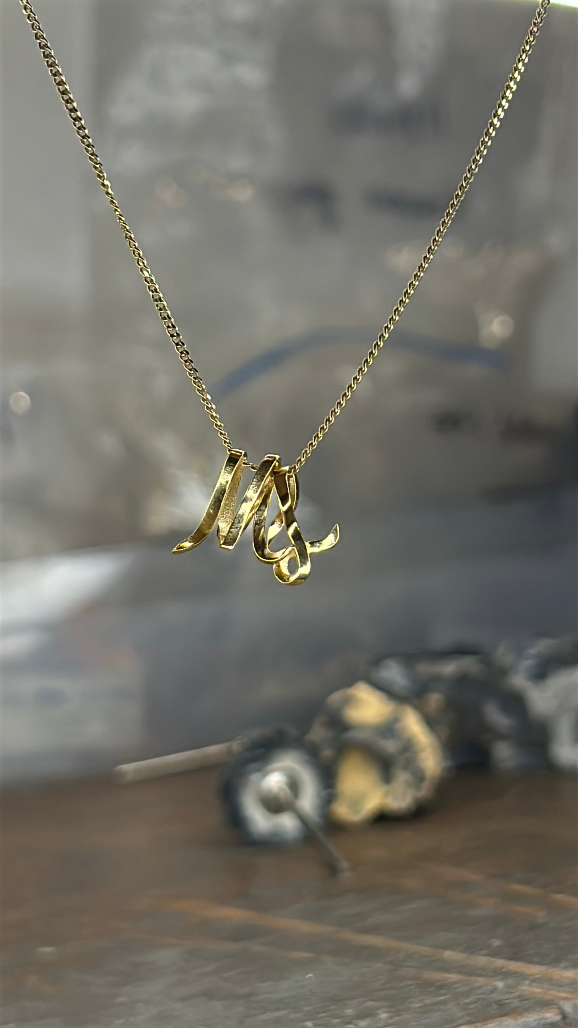 Inital Charm