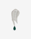 Handcrafted silver brooch with a green gemstone hanging from the bottom on a white background