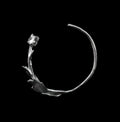 Silver Hancrafted floreo bracelent on black background
