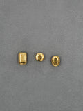 Handcrafted gold pendants in different gemstone shapes