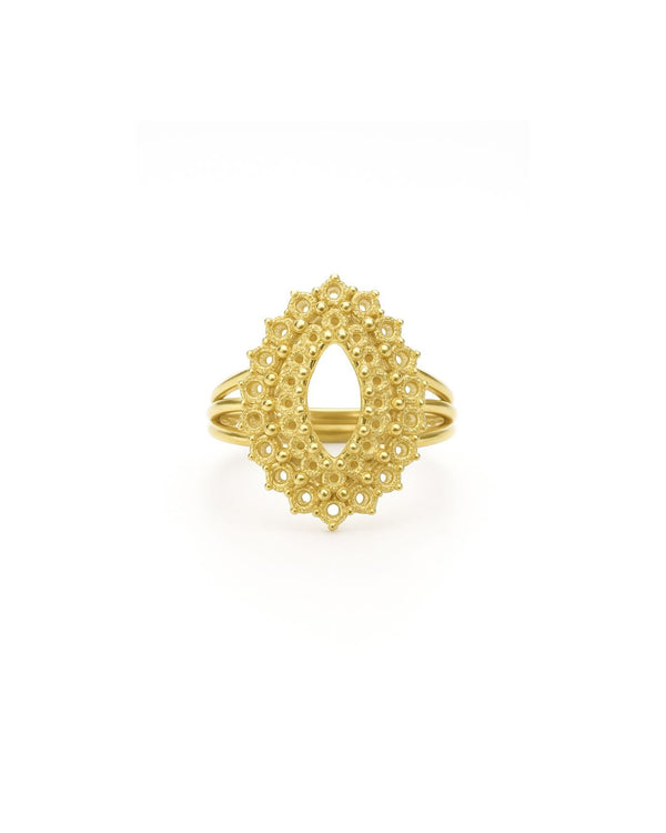 Handcrafted gold ring on white background