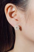 Handcrafted Silver earring worn by model